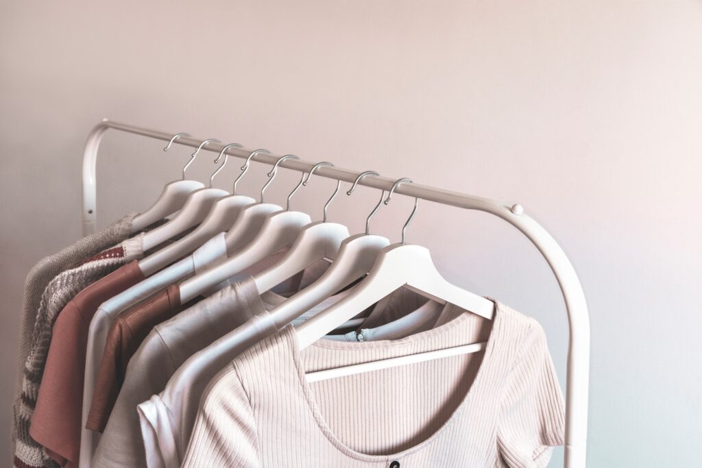 Rack with stylish women's summer clothes. Concept for shopping store, beauty, fashion